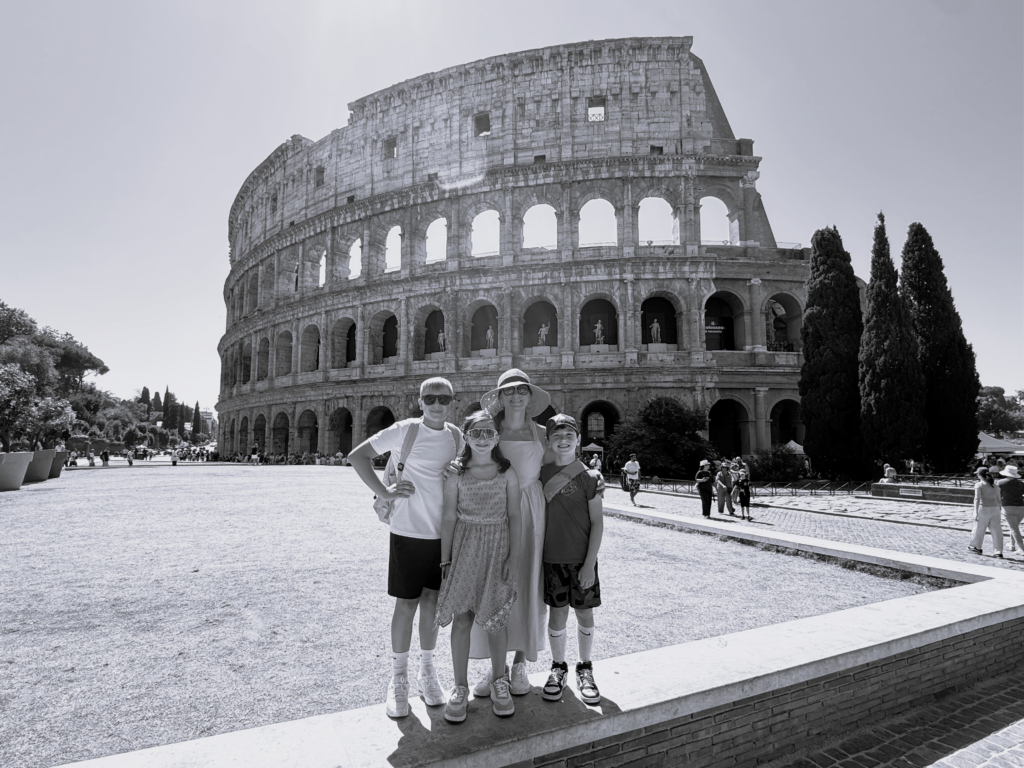 Lauren and her family in front of the Colosseum in Rome